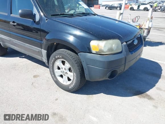 ✅ 2005 Ford Escape XLT • VIN: 1FMYU93135KB23105 • Lot: 41849131. Listed on IAAI with 164,645 mi. Free auction sales archive from the USA and detailed vehicle history report at DreamBid. Image 6.