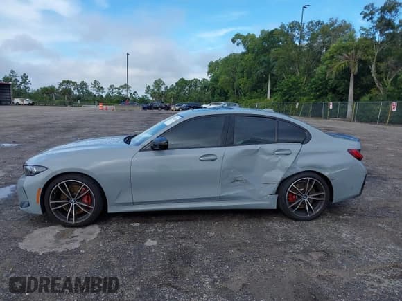 ✅ 2023 BMW 3 Series 330i • VIN: 3MW69FF00P8D29806 • Lot: 43413363. Listed on IAAI with 29,477 mi. Free auction sales archive from the USA and detailed vehicle history report at DreamBid. Image 14.