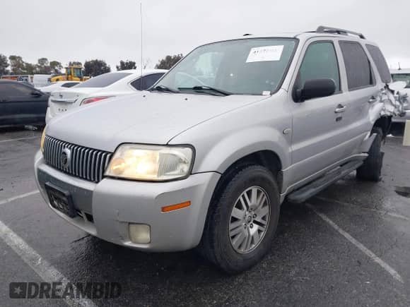 2005 Mercury Mariner Luxury z VIN 4M2CU561X5DJ16539, wystawiony jako IAAI lot #41572981 z przebiegiem 157 461 mil mil oraz . Historia ofert i sprzedaży dostępna na DreamBid. Obrazek 2.