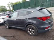 ✅ 2017 Hyundai Santa Fe 2.4L • VIN: 5XYZUDLB5HG397310 • Lot: 42314099. Listed on IAAI with 99,061 mi. Free auction sales archive from the USA and detailed vehicle history report at DreamBid. Image 14.