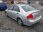 ✅ 2009 Kia Spectra EX • VIN: KNAFE222095027380 • Lot: 43730880. Listed on IAAI with 200,112 mi. Free auction sales archive from the USA and detailed vehicle history report at DreamBid. Image 3.