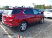 ✅ 2018 Chevrolet Equinox Premier • VIN: 2GNAXVEVXJ6129543 • Lot: 43584104. Listed on IAAI with 54,807 mi. Free auction sales archive from the USA and detailed vehicle history report at DreamBid. Image 4.