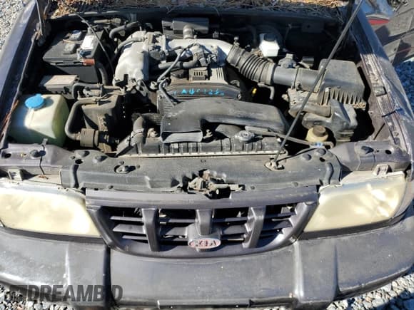 ✅ 2000 Kia Sportage • VIN: KNDJB7237Y5683960 • Lot: 75192944. Listed on Copart with 127,615 mi. Free auction sales archive from the USA and detailed vehicle history report at DreamBid. Image 12.