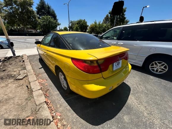 ✅ 2001 Saturn SC • VIN: 1G8ZY12771Z105142 • Лот: 67220545. Опубликован ранее на Copart с пробегом 166 396 миль. Бесплатный доступ к архиву аукционных продаж из США и подробный отчёт об истории автомобиля на DreamBid. Изображение 3.