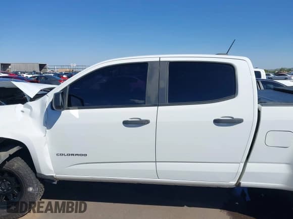 ✅ 2021 Chevrolet Colorado 2WD Work Truck • VIN: 1GCGSBEN0M1100334 • Лот: 43433489. Опубликован ранее на IAAI с пробегом 87 605 миль. Бесплатный доступ к архиву аукционных продаж из США и подробный отчёт об истории автомобиля на DreamBid. Изображение 15.