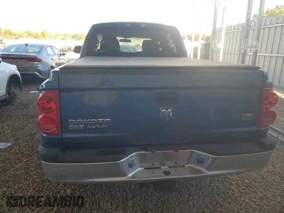 2006 Dodge Dakota SLT с VIN 1D7HW48N16S704445, выставлен на аукционе Copart как лот 73714614 с пробегом 128 585 миль миль и Чистый • Clean title. История ставок и продаж доступна на DreamBid. Изображение 6.