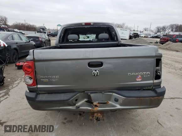 2010 Dodge Dakota SXT with VIN 1D7CW3GP7AS176121, listed as a Copart auction lot 85169354 with Not provided miles and Salvage title. Bid and sale history available at DreamBid. Image 6.
