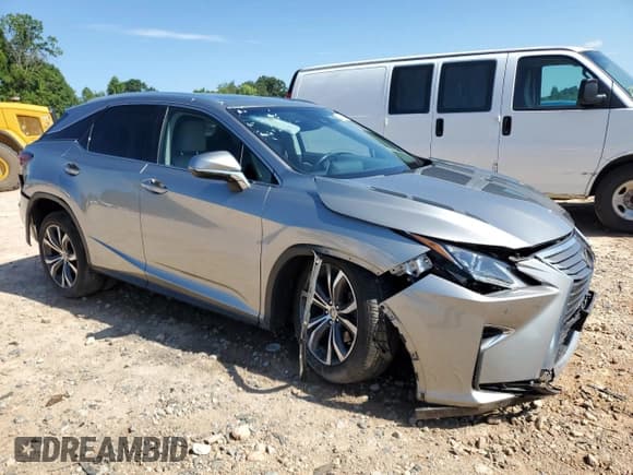 ✅ 2017 Lexus RX 350 • VIN: 2T2BZMCA2HC084197 • Lot: 64711255. Listed on Copart with 52,075 mi. Free auction sales archive from the USA and detailed vehicle history report at DreamBid. Image 4.