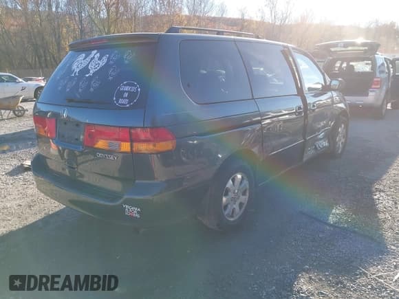 ✅ 2003 Honda Odyssey EX-L • VIN: 5FNRL18903B081594 • Lot: 43641667. Wystawiony na IAAI z przebiegiem 200 822 mil. Bezpłatny archiwum sprzedaży aukcyjnych z USA i szczegółowy raport historii pojazdu na DreamBid. Zdjęcie 4.