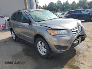 ✅ 2011 Hyundai Santa Fe GLS • VIN: 5XYZGDAB6BG061151 • Lot: 77972384. Listed on Copart with 99,885 mi. Free auction sales archive from the USA and detailed vehicle history report at DreamBid. Image 4.