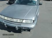 ✅ 1993 Pontiac Grand Prix LE • VIN: 1G2WH54T0PF242464 • Lot: 35153853. Listed on IAAI with 122,467 mi. Free auction sales archive from the USA and detailed vehicle history report at DreamBid. Image 6.