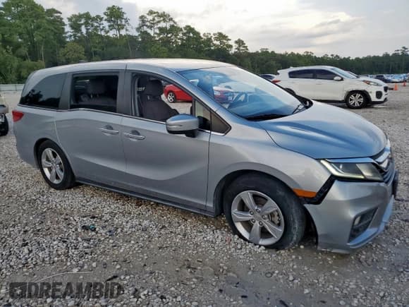 ✅ 2018 Honda Odyssey EX • VIN: 5FNRL6H52JB095665 • Lot: 89849205. Listed on Copart with 82,873 mi. Free auction sales archive from the USA and detailed vehicle history report at DreamBid. Image 4.