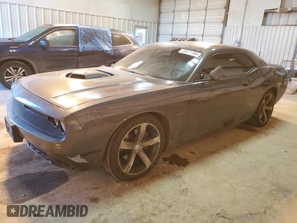 ✅ 2016 Dodge Challenger R/T • VIN: 2C3CDZBT1GH157737 • Lot: 40671184. Wystawiony na Copart z przebiegiem 133 872 mil. Bezpłatny archiwum sprzedaży aukcyjnych z USA i szczegółowy raport historii pojazdu na DreamBid. Zdjęcie 1.