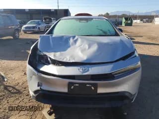 ✅ 2023 Toyota Prius XLE • VIN: JTDACAAU9P3002468 • Лот: 86483095. Опубликован ранее на Copart с пробегом 52 673 миль. Бесплатный доступ к архиву аукционных продаж из США и подробный отчёт об истории автомобиля на DreamBid. Изображение 5.