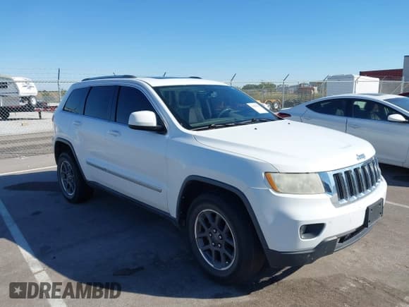 ✅ 2013 Jeep Grand Cherokee Laredo • VIN: 1C4RJFAG3DC537355 • Lot: 43385689. Listed on IAAI with 183,392 mi. Free auction sales archive from the USA and detailed vehicle history report at DreamBid. Image 1.