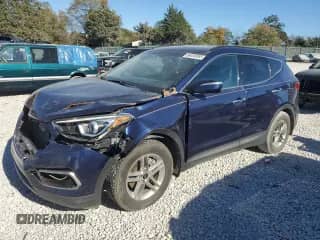 2018 Hyundai Santa Fe 2.4L с VIN 5XYZU3LB7JG535767, выставлен на аукционе Copart как лот 86456955 с пробегом 139 004 миль миль и Списание • Salvage title. История ставок и продаж доступна на DreamBid. Изображение 1.
