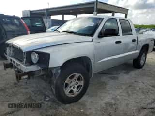 ✅ 2007 Dodge Dakota SLT • VIN: 1D7HW48J57S118474 • Лот: 69220394. Размещён на Copart с пробегом 140 302 миль миль. Получите бесплатный доступ к архиву аукционных продаж из США и посмотрите подробный отчёт об истории автомобиля на DreamBid. Изображение 1.