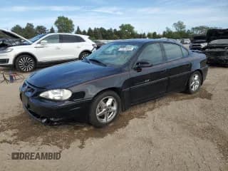 ✅ 2001 Pontiac Grand Am GT • VIN: 1G2NW52E41C119801 • Лот: 71975055. Опубликован ранее на Copart с пробегом 145 929 миль. Бесплатный доступ к архиву аукционных продаж из США и подробный отчёт об истории автомобиля на DreamBid. Изображение 1.