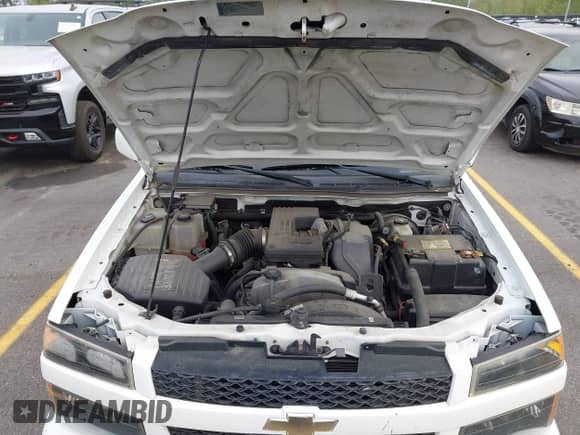 2012 Chevrolet Colorado 1LT z VIN 1GCDSCFE0C8101609, wystawiony jako IAAI lot #41914027 z przebiegiem 143 805 mil mil oraz . Historia ofert i sprzedaży dostępna na DreamBid. Obrazek 10.