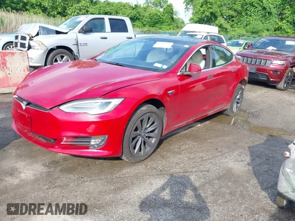 ✅ 2020 Tesla Model S Long Range • VIN: 5YJSA1E25LF396213 • Lot: 42383231. Listed on IAAI with 73,125 mi. Free auction sales archive from the USA and detailed vehicle history report at DreamBid. Image 2.