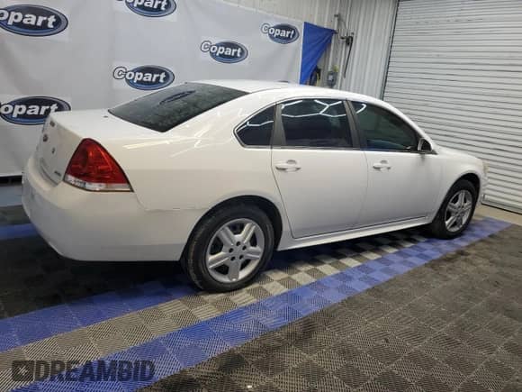 2014 Chevrolet Impala Police Police with VIN 2G1WD5E34E1183499, listed as a Copart auction lot 63675565 with 128,644 mi miles and Clean title. Bid and sale history available at DreamBid. Image 3.