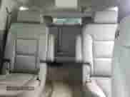 2015 Chevrolet Suburban LT z VIN 1GNSKJKCXFR309776, wystawiony jako Copart lot #74351814 z przebiegiem 162 346 mil mil oraz Szkoda całkowita • Salvage title. Historia ofert i sprzedaży dostępna na DreamBid. Obrazek 10.