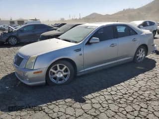 ✅ 2008 Cadillac STS RWD • VIN: 1G6DW67V780100258 • Лот: 76200014. Опубликован ранее на Copart с пробегом 165 880 миль. Бесплатный доступ к архиву аукционных продаж из США и подробный отчёт об истории автомобиля на DreamBid. Изображение 1.