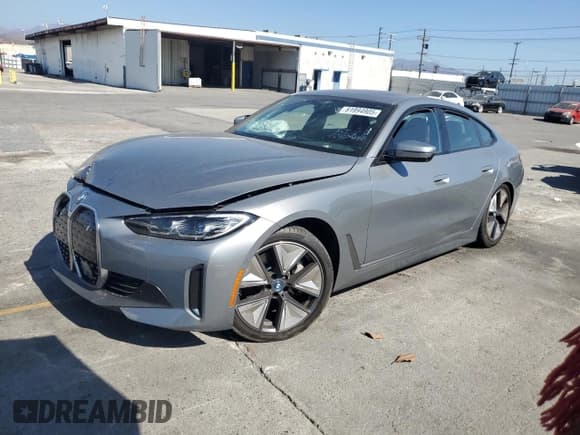 ✅ 2023 BMW i4 eDrive40 • VIN: WBY73AW00PFR45409 • Lot: 81994905. Listed on Copart with 16,858 mi. Free auction sales archive from the USA and detailed vehicle history report at DreamBid. Image 1.
