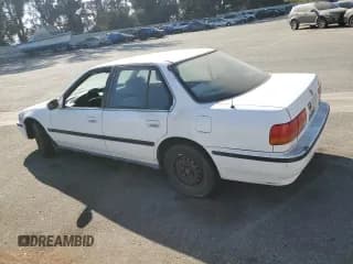 ✅ 1993 Honda Accord LX • VIN: JHMCB7651PC017612 • Lot: 73041854. Listed on Copart with 334,877 mi. Free auction sales archive from the USA and detailed vehicle history report at DreamBid. Image 2.