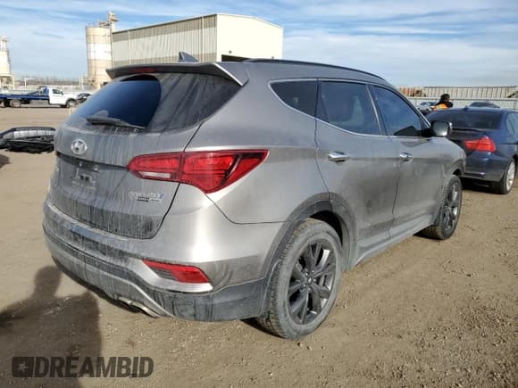 ✅ 2018 Hyundai Santa Fe Ultimate • VIN: 5XYZWDLA2JG505521 • Lot: 36359633. Listed on Copart with 46,847 mi. Free auction sales archive from the USA and detailed vehicle history report at DreamBid. Image 3.