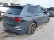 ✅ 2023 Volkswagen Tiguan SE R-Line Black • VIN: 3VVCB7AX2PM107104 • Lot: 42313212. Listed on IAAI with 27,500 mi. Free auction sales archive from the USA and detailed vehicle history report at DreamBid. Image 4.