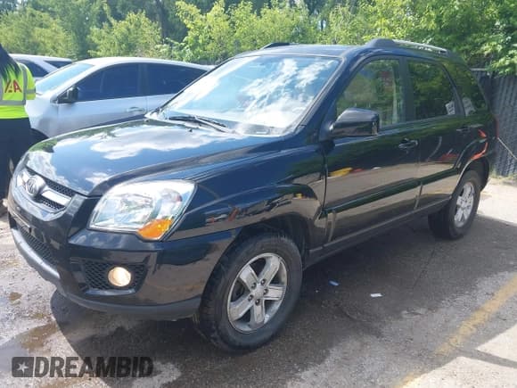 ✅ 2009 Kia Sportage LX • VIN: KNDJE723297623856 • Lot: 42318985. Listed on IAAI with 106,793 mi. Free auction sales archive from the USA and detailed vehicle history report at DreamBid. Image 18.