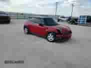 2009 MINI Hardtop z VIN WMWMF33539TW70482, wystawiony jako Copart lot #86130595 z przebiegiem 120 031 mil mil oraz Szkoda całkowita • Salvage title. Historia ofert i sprzedaży dostępna na DreamBid. Obrazek 14.