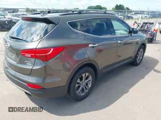 2014 Hyundai Santa Fe with VIN 5XYZUDLB1EG227778, listed as a IAAI auction lot 43033757 with 135,496 mi miles and . Bid and sale history available at DreamBid. Image 4.