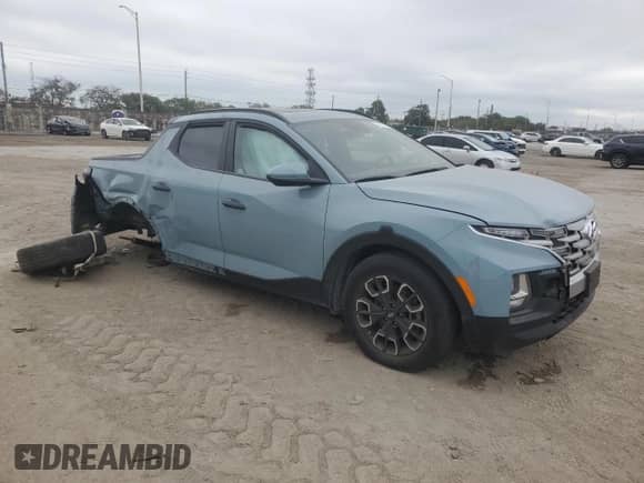 2023 Hyundai Santa Cruz SEL с VIN 5NTJC4AE4PH043025, выставлен на аукционе Copart как лот 41617645 с пробегом Не указан миль и На запчасти • Non repairable. История ставок и продаж доступна на DreamBid. Изображение 4.