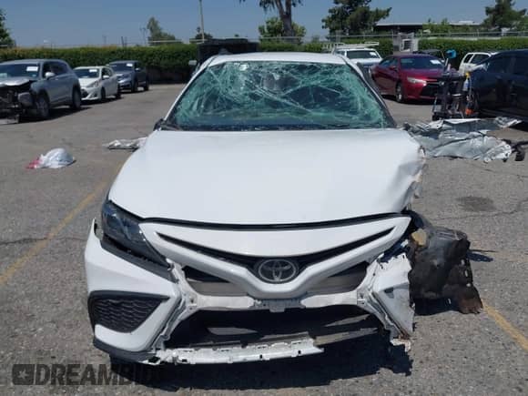 2022 Toyota Camry SE z VIN 4T1T11AK9NU047717, wystawiony jako IAAI lot #42316618 z przebiegiem 86 410 mil mil oraz . Historia ofert i sprzedaży dostępna na DreamBid. Obrazek 12.