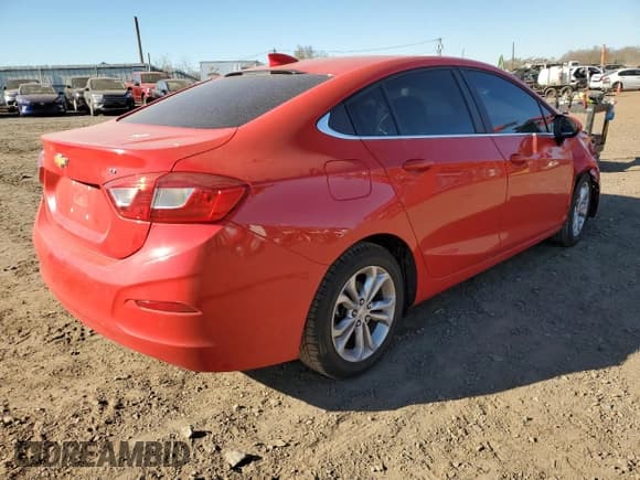 ✅ 2019 Chevrolet Cruze LT • VIN: 1G1BE5SM1K7106998 • Lot: 66036232. Listed on Copart with 68,415 mi. Free auction sales archive from the USA and detailed vehicle history report at DreamBid. Image 4.