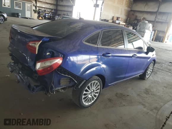 ✅ 2014 Ford Fiesta Titanium • VIN: 3FADP4CJ2EM163509 • Lot: 68381635. Wystawiony na Copart z przebiegiem 122 238 mil. Bezpłatny archiwum sprzedaży aukcyjnych z USA i szczegółowy raport historii pojazdu na DreamBid. Zdjęcie 3.