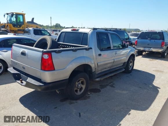 ✅ 2004 Ford Explorer Sport Trac XLS • VIN: 1FMZU77K34UA65740 • Lot: 43589534. Listed on IAAI with 310,281 mi. Free auction sales archive from the USA and detailed vehicle history report at DreamBid. Image 4.