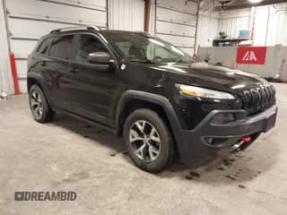 ✅ 2015 Jeep Cherokee Trailhawk • VIN: 1C4PJMBS7FW650340 • Lot: 43755791. Listed on IAAI with 129,855 mi. Free auction sales archive from the USA and detailed vehicle history report at DreamBid. Image 1.