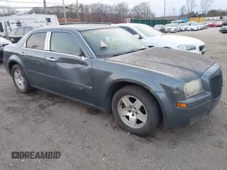 ✅ 2005 Chrysler 300 300 • VIN: 2C3AA43R95H663173 • Lot: 41361390. Wystawiony na IAAI z przebiegiem Nie podano. Bezpłatny archiwum sprzedaży aukcyjnych z USA i szczegółowy raport historii pojazdu na DreamBid. Zdjęcie 1.
