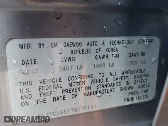 2007 Chevrolet Aveo LS z VIN KL1TD56677B075195, wystawiony jako Copart lot #84818114 z przebiegiem 98 549 mil mil oraz Szkoda całkowita • Salvage title. Historia ofert i sprzedaży dostępna na DreamBid. Obrazek 13.