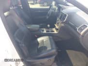 ✅ 2014 Jeep Grand Cherokee Overland • VIN: 1C4RJFCG0EC238873 • Lot: 42436535. Listed on IAAI with 154,384 mi. Free auction sales archive from the USA and detailed vehicle history report at DreamBid. Image 5.