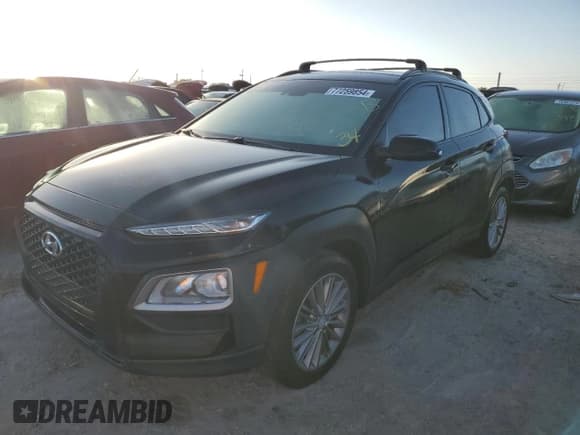 ✅ 2020 Hyundai Kona SEL • VIN: KM8K22AA7LU476048 • Лот: 77259854. Опубликован ранее на Copart с пробегом 53 236 миль. Бесплатный доступ к архиву аукционных продаж из США и подробный отчёт об истории автомобиля на DreamBid. Изображение 1.