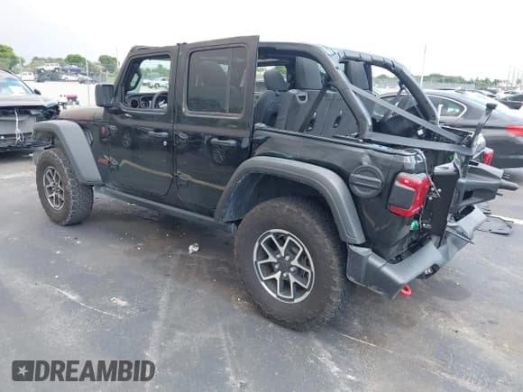 ✅ 2024 Jeep Wrangler Rubicon • VIN: 1C4PJXFG0RW350411 • Lot: 43039072. Listed on IAAI with 7,837 mi. Free auction sales archive from the USA and detailed vehicle history report at DreamBid. Image 3.