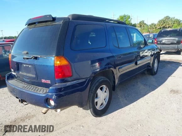 ✅ 2003 GMC Envoy SLT • VIN: 1GKET16S736233956 • Lot: 41844351. Wystawiony na IAAI z przebiegiem 244 942 mil. Bezpłatny archiwum sprzedaży aukcyjnych z USA i szczegółowy raport historii pojazdu na DreamBid. Zdjęcie 4.