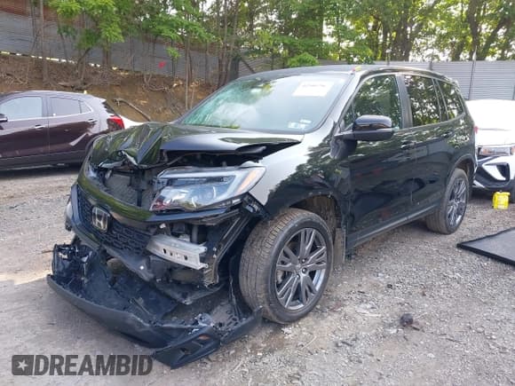 ✅ 2021 Honda Passport EX-L • VIN: 5FNYF8H57MB022083 • Lot: 42399294. Listed on IAAI with 61,014 mi. Free auction sales archive from the USA and detailed vehicle history report at DreamBid. Image 18.