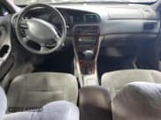 ✅ 2000 Nissan Altima XE • VIN: 1N4DL01D4YC246799 • Lot: 70599524. Wystawiony na Copart z przebiegiem 122 770 mil. Bezpłatny archiwum sprzedaży aukcyjnych z USA i szczegółowy raport historii pojazdu na DreamBid. Zdjęcie 8.