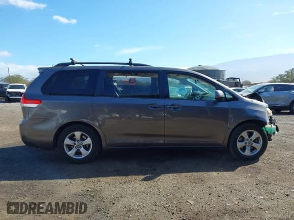 ✅ 2014 Toyota Sienna LE AAS • VIN: 5TDKK3DC5ES445105 • Lot: 41097560. Listed on IAAI with 114,283 mi. Free auction sales archive from the USA and detailed vehicle history report at DreamBid. Image 14.