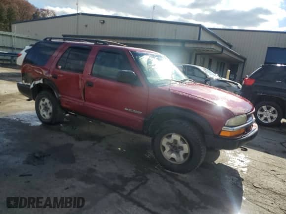2003 Chevrolet Blazer LS z VIN 1GNDT13X73K186384, wystawiony jako Copart lot #78837914 z przebiegiem 241 159 mil mil oraz Szkoda całkowita • Salvage title. Historia ofert i sprzedaży dostępna na DreamBid. Obrazek 4.
